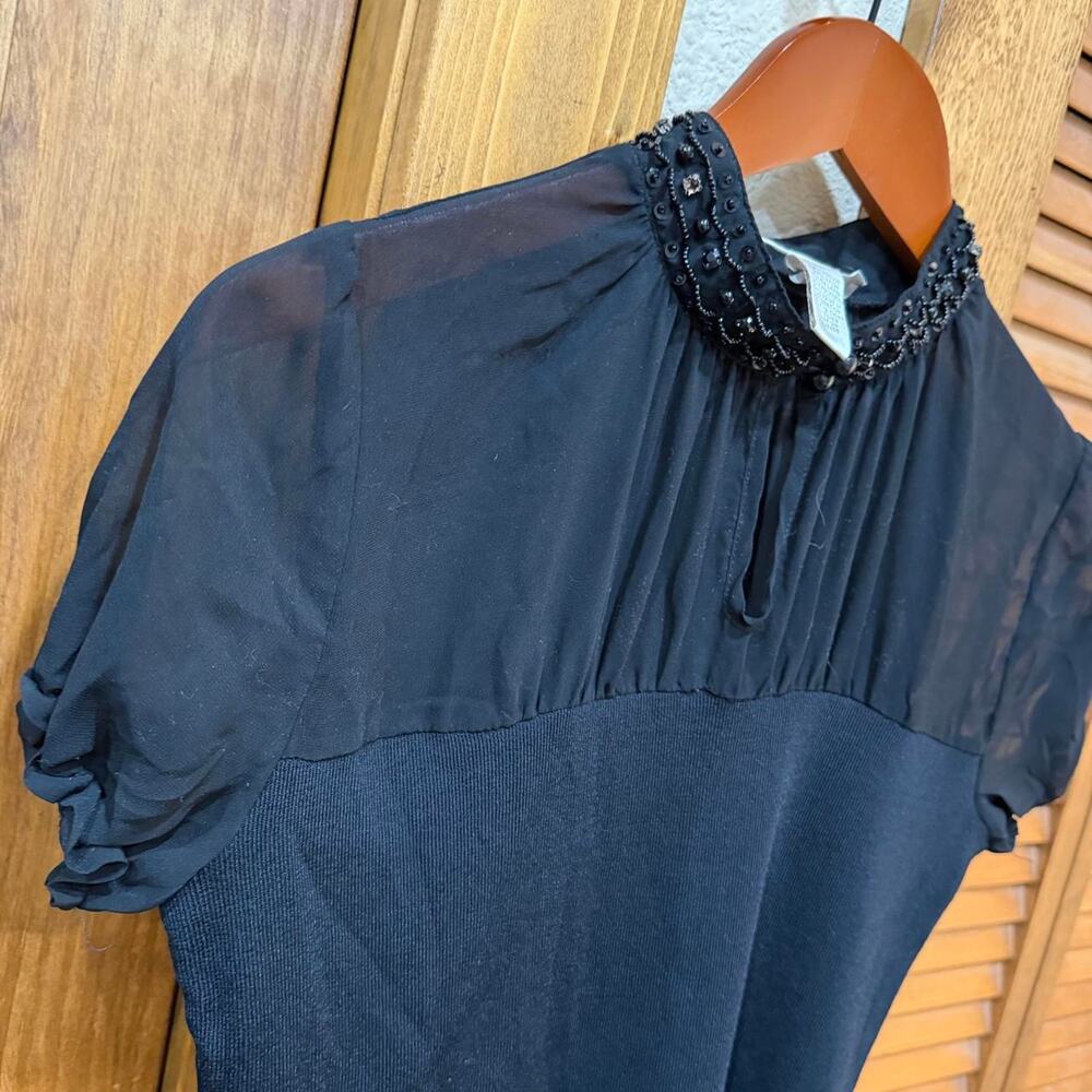 Whimsy goth sheer top blouse with button detail on collar